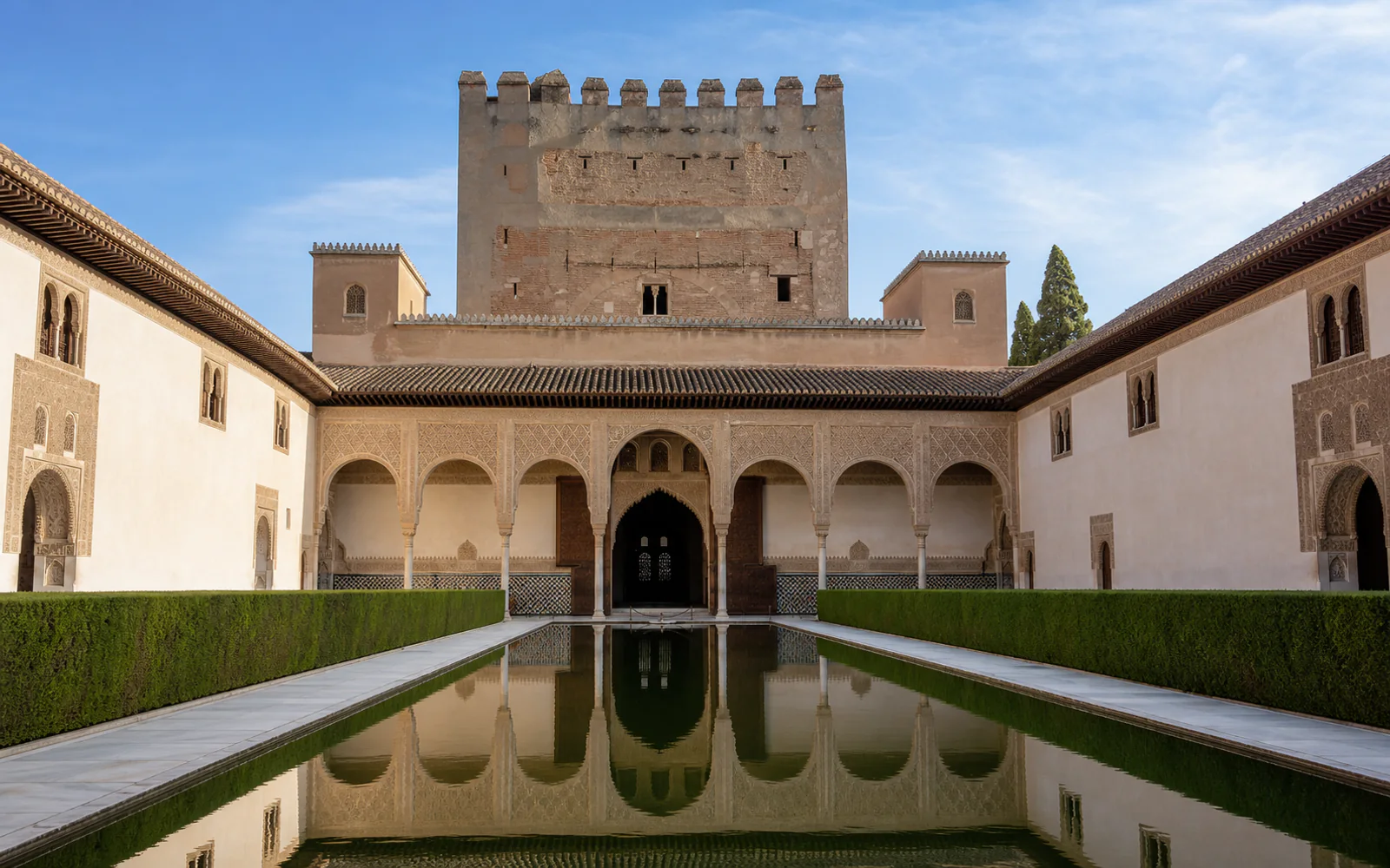 The Court of the Myrtles and Comares Tower at the Alhambra in Granada